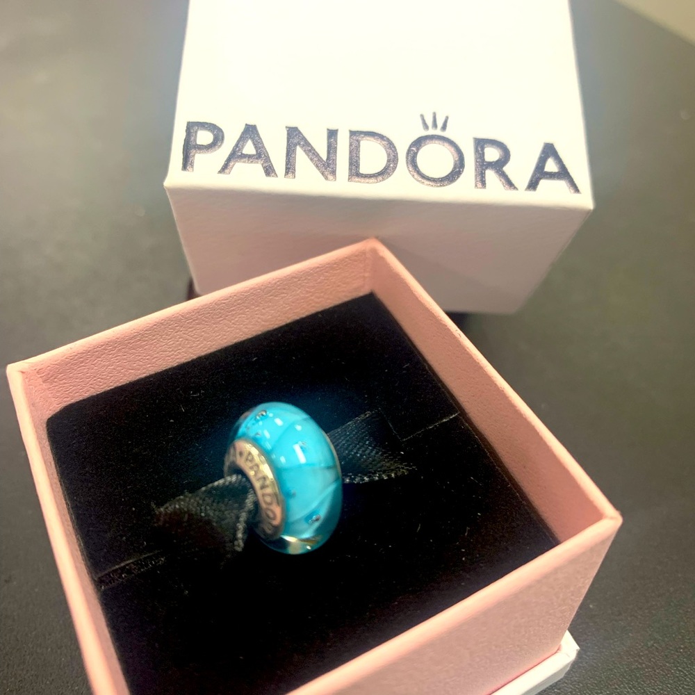 Blue glass Pandora charm gently worn in new box